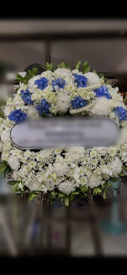 พวงหรีดกล้วยไม้ โทนฟ้าขาวเขียว