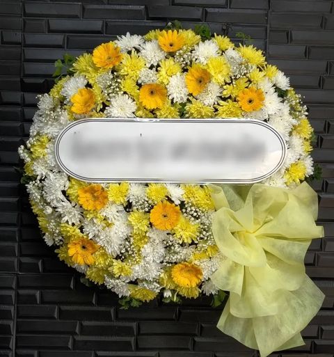 พวงหรีดเยอบีร่า โทนส้มเหลือง