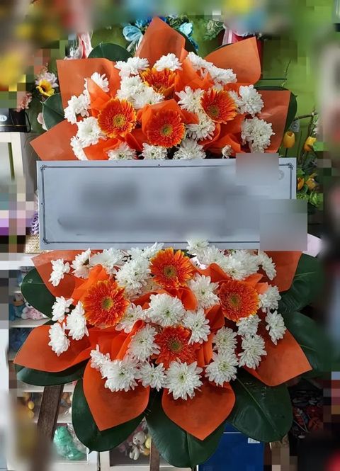 พวงหรีดเยอบีร่า โทนส้ม